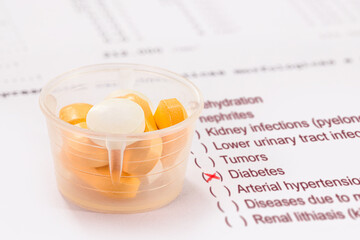 pills and oral medication for diabetes control, spot focus, medical exam result