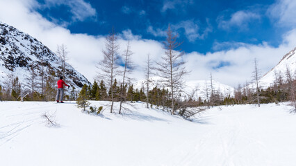 Man springtime backcountry skiing in the Chics-Chocs Mountains, Quebec, Canada