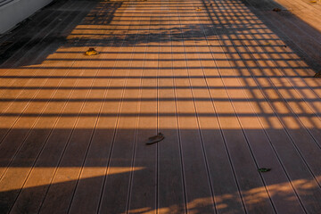 Fototapeta premium wooden floor planks on a bright sunny day