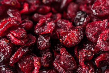 dried cranberry on a white acrylic background