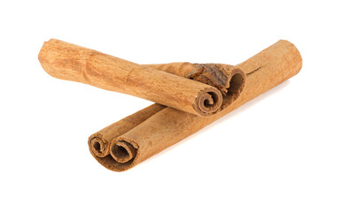 two cinnamon sticks isolated on white background