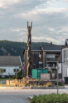 Lindesnes, Norway - July 31 2021: Bronze sculpture Tre spreke jenter by Uwe Wenk-Wolff in a roundabout at Vigeland.