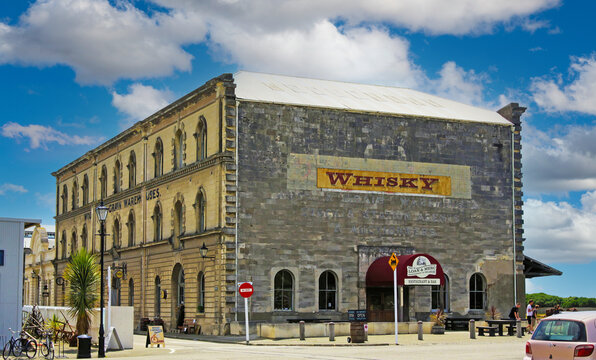 Oamaru, New Zealand - December 9. 2013: View on historical wool and grain warehouse stone building (focus on center of house front)
