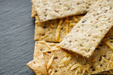 diet crispy bread on a black stone background