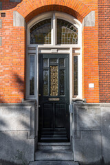 Fototapeta na wymiar Typical dutch architectural detail, a door in Rotterdam