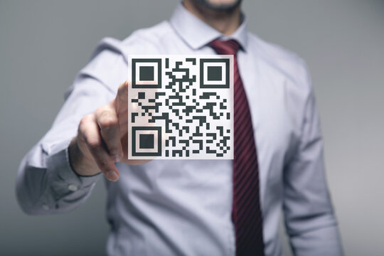 Scan QR code icon. Digital scanning qr code. man tapping on the screen
