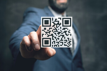 Scan QR code icon. Digital scanning qr code. man tapping on the screen