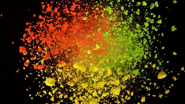 Super Slow Motion Shot of Rotating Color Powder Expolosion Isolated on Black Background at 1000fps.