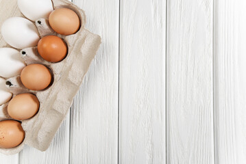 eggs on white wooden background