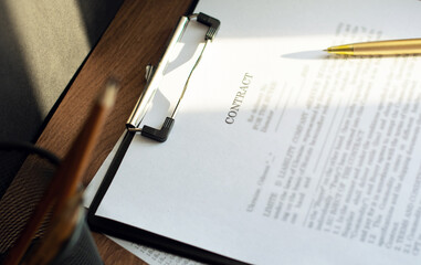Business contract and pen on the table. Business and finance concept. Selective focus.