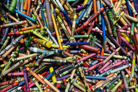 Large Box of Used Crayons for Sale in a Recycling Center