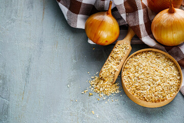 dried onions on a gray stone background