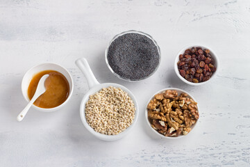 Ingredients for cooking the traditional slavic dish sochivo or kutia: barley, poppy seeds, nuts, raisins and honey
