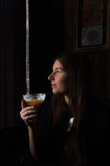 beautiful woman drinking cocktail
