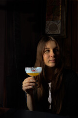 woman drinking cocktail