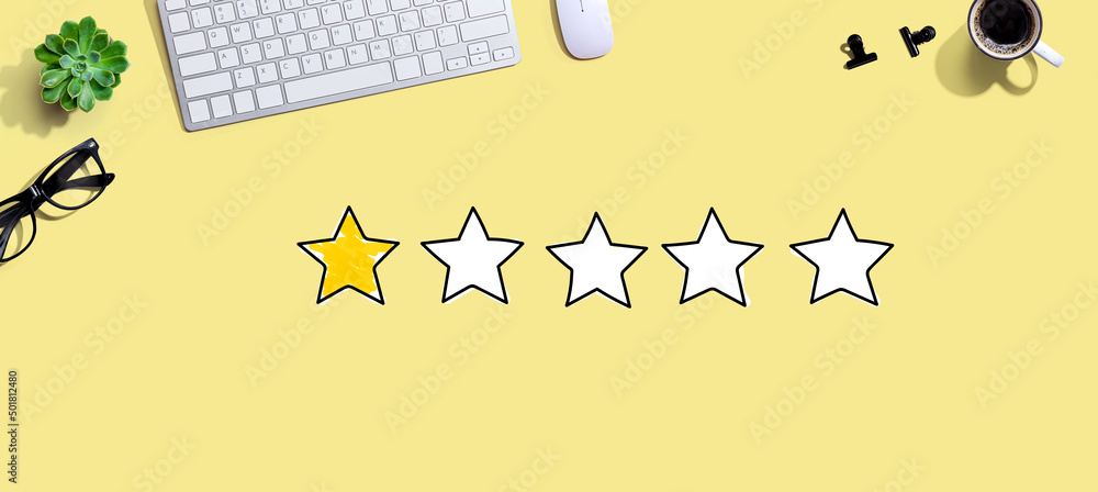 Aufkleber one star rating with a computer keyboard and a mouse
