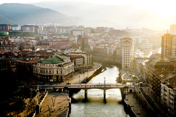 Bilbao skyline, view from above. Beautiful city between mountains on the Spain north. - obrazy, fototapety, plakaty