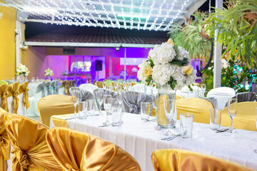 white bouquet on table at a social event