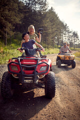 Girls driving a off road buggy car