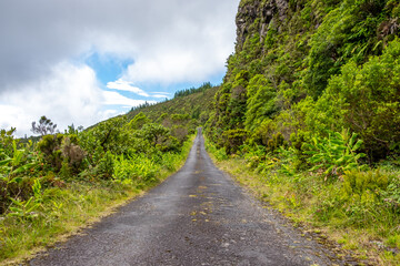 Fototapeta na wymiar Landscape view over an old secondary traditional road in Lombadas Springs on the island of Sao Miguel, Azores, Portugal.