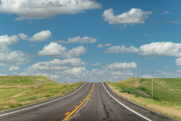 Fototapeta na wymiar An Empty Road on a Beautiful Day in Kansas