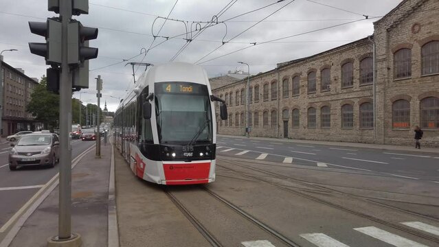 A tram on P&radic;&sect;rnu maantee, a busy road in Tallinn