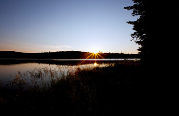 A beautiful sunset over a lake in an Ontario Provincial Park.