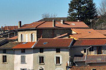 Obraz premium Aerial view of dense historic center of Thiers town in Puy-de-Dome department, Auvergne-Rhone-Alpes region in France. Rooftops of old buildings and narrow streets