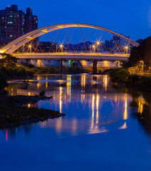 Twilight view of the Jingmei arch bridge