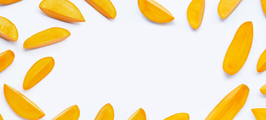 Tropical fruit, Frame made of mango slices on white background.