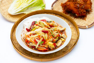 Spicy green papaya salad with vermicelli.