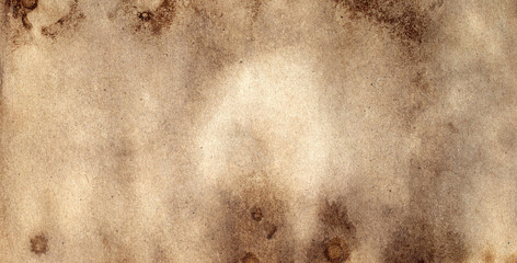 Old brown paper grunge background. Abstract liquid coffee color texture.