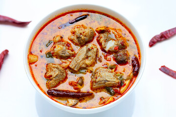 Thai food, Spicy soup with pork ribs on white background.