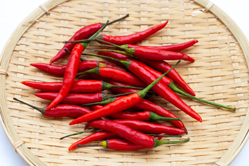 Hot chili peppers in bamboo plate