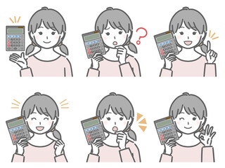 電卓を手に持つ女の子