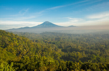Fototapeta premium Beautiful Scene of Merapi Mountain from Gereja Ayam, at Bukit Rhema, Magelang, Central Java, Indonesia.
