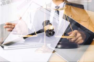 Judge gavel and legal book on wooden table, justice and law concept