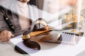 Judge gavel and legal book on wooden table, justice and law concept
