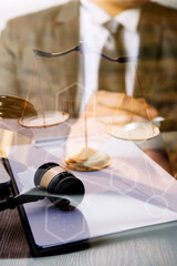 Judge gavel and legal book on wooden table, justice and law concept