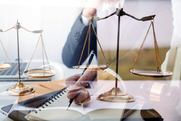 Judge gavel and legal book on wooden table, justice and law concept