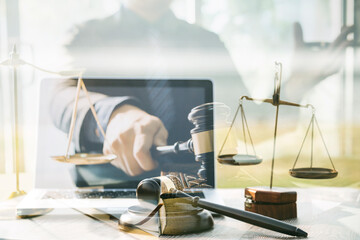 Judge gavel and legal book on wooden table, justice and law concept