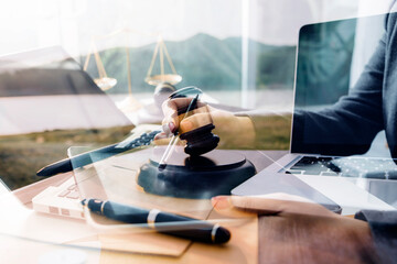 Judge gavel and legal book on wooden table, justice and law concept