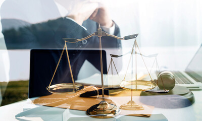 Judge gavel and legal book on wooden table, justice and law concept