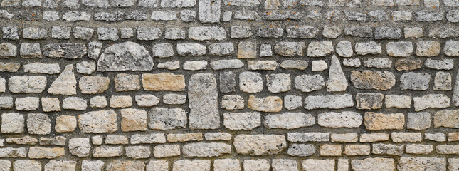 stone textured long made of mesh and stones background wall horizontal facade