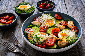Chicken salad  - chicken nuggets, hard boiled eggs, cherry tomatoes, lettuce, cucumber and sprouts...