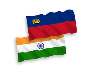 National vector fabric wave flags of India and Liechtenstein isolated on white background. 1 to 2 proportion.