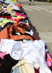 Obraz premium clothes stall for sale at the street market