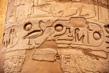 Different columns with hieroglyphs in Karnak temple. Karnak temple is the largest complex in...