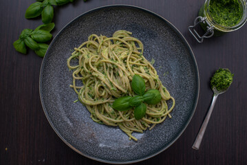 spaghetti with fresh basil pesto and herbs 