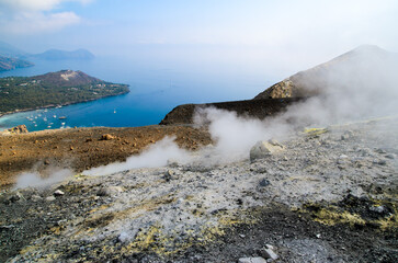 Panoramic aerial view of Lipari and Vulcanello from the top of the volcano crater of Vulcano island, Aeolian Islands Archipelago, Sicily, Italy
